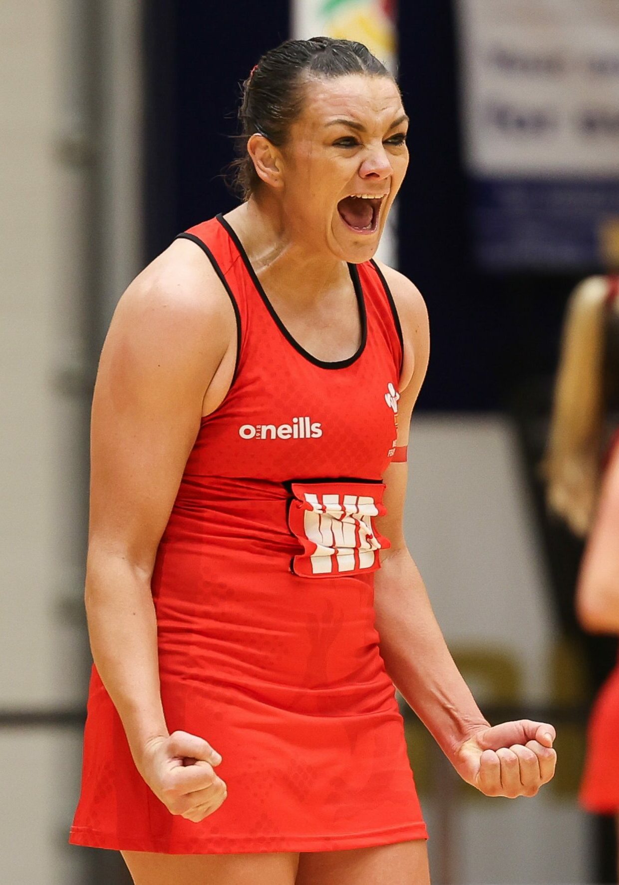 10.01.24 - Welsh Feathers v Uganda, International Netball Series - Nia Jones of Welsh Feathers celebrates at the end of the match